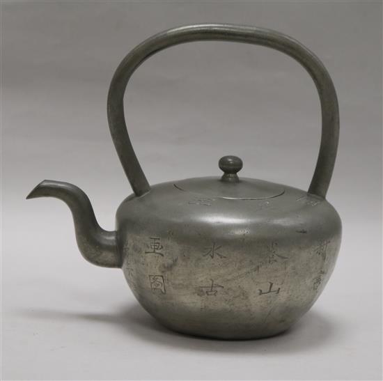 A late 19th century/ early 20th century Chinese pewter teapot height 18cm